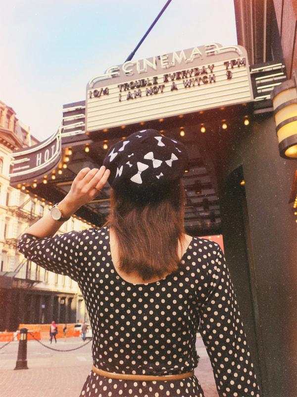 polka dot dress | beret | bows | retro style | movie marquee 